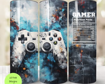 May include: A white and blue gamer themed tumbler with a graphic of a video game controller. The tumbler has a black lid and a silver straw. The text "GAMER Nutrition Facts" is printed on the tumbler. The text includes a humorous list of "nutrition facts" for gamers, such as "XP (Level Ups)", "Respawns", "Rage Quits", and "Team Work".