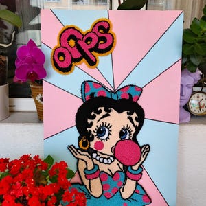Oops Punch Needle Wall Art – Retro Pop Cartoon Girl – Handmade Bubblegum Embroidery – Colorful Fiber Art Home Decor