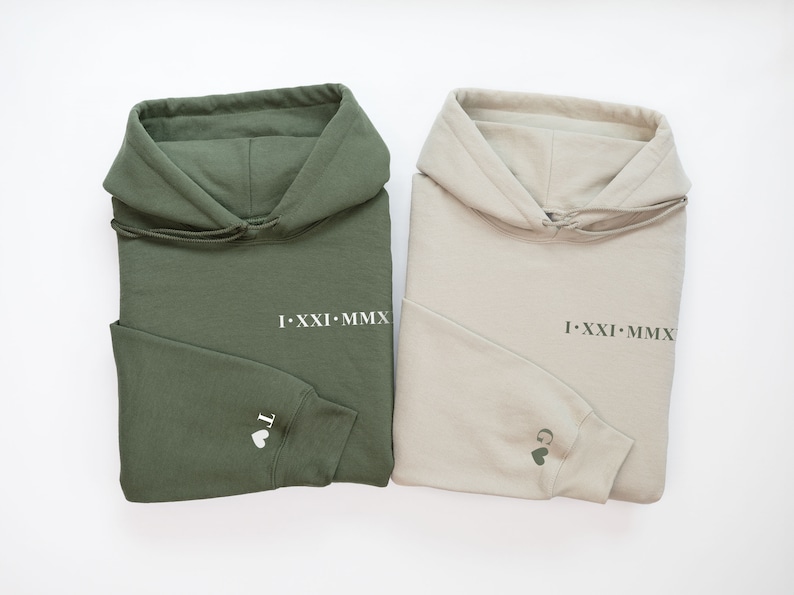Roman Numeral Hoodies in green and Sand with an initial with a heart next to it