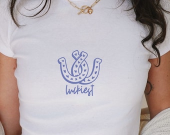 Luckiest Baby Tee: Coquette Cowgirl Horseshoe Graphic Top