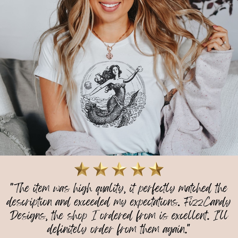 May include: A white t-shirt with a black and white illustration of a mermaid in a circle. The mermaid is holding a seashell. The text "Fizz Candy Designs" is included in the review.