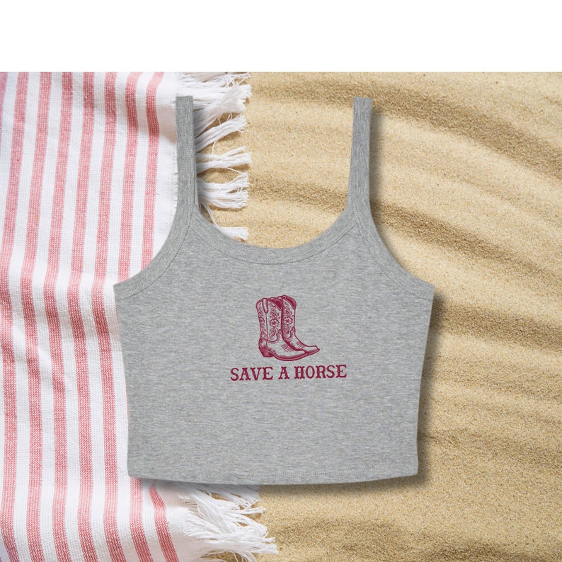 May include: A gray tank top with a red graphic of cowboy boots and the text "SAVE A HORSE".