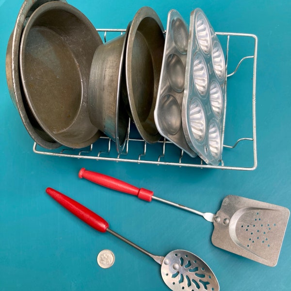 Toy metal dish drainer, baking pans, muffin tins, slotted spoon, cookie turner, 1940s-1960s