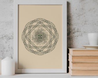 May include: A white framed print with a beige background featuring a black and white mandala with a green eye in the center.