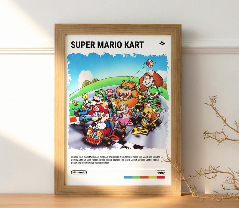 May include: A framed poster for the Super Mario Kart video game. The poster features a colorful illustration of Mario, Luigi, Donkey Kong Jr., and other characters racing on a track. The text on the poster reads "Super Mario Kart" and "Nintendo 1992".