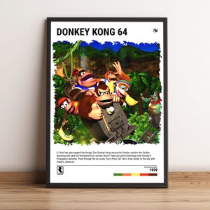 May include: A framed poster titled DONKEY KONG 64 featuring a central illustration of Donkey Kong and other characters in a jungle setting. The text below describes the game plot, including the date 1999 and a rating symbol in the bottom corner.