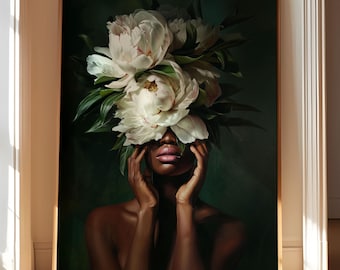 May include: A framed art print featuring a woman with a large arrangement of white peonies covering her eyes. The artwork has a dark green background and a gold frame. The woman's skin is dark, and her lips are a soft pink.