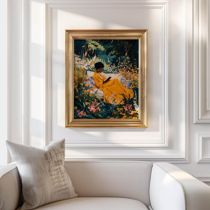 May include: A framed painting depicts a person in a yellow dress reading in a garden. The artwork features a gold frame and is displayed on a white wall. The painting's color palette includes yellow, green, and pink.
