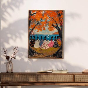 May include: A painting of a group of women in colorful dresses sitting under a tree by the ocean. The women are all facing away from the viewer and are looking out at the water. There is a sailboat in the distance.