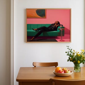May include: A framed artwork featuring a person in a black suit reclining on a green sofa. A small side table holds a cocktail. The background is pink, with an abstract painting above the sofa. A wooden table with a bowl of fruit and a vase of flowers is in the foreground.
