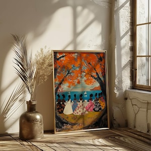 May include: A framed painting of a group of women in colorful dresses sitting under a tree with orange leaves. The women are facing away from the viewer and are looking out at a body of water with a sailboat in the distance.