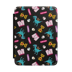 May include: A black tablet case featuring a repeating pattern of blue dinosaurs, white boxer shorts with red hearts, yellow trophies, white skulls, and pink rectangular speech bubbles containing the text "GODDAMNIT DONUT" or "GLURP GLURP".