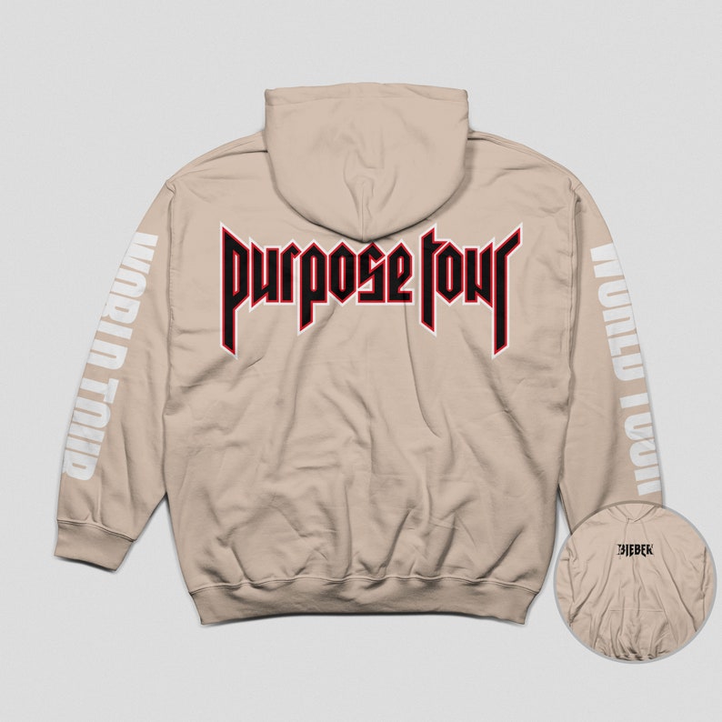 May include: A beige hoodie with a red and black "Purpose Tour" graphic on the back and "World Tour" text on the sleeves.