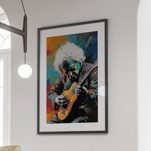 May include: A framed abstract painting of a person playing a guitar. The painting is in a black frame and has a colorful background with splashes of orange, yellow, blue, and green.