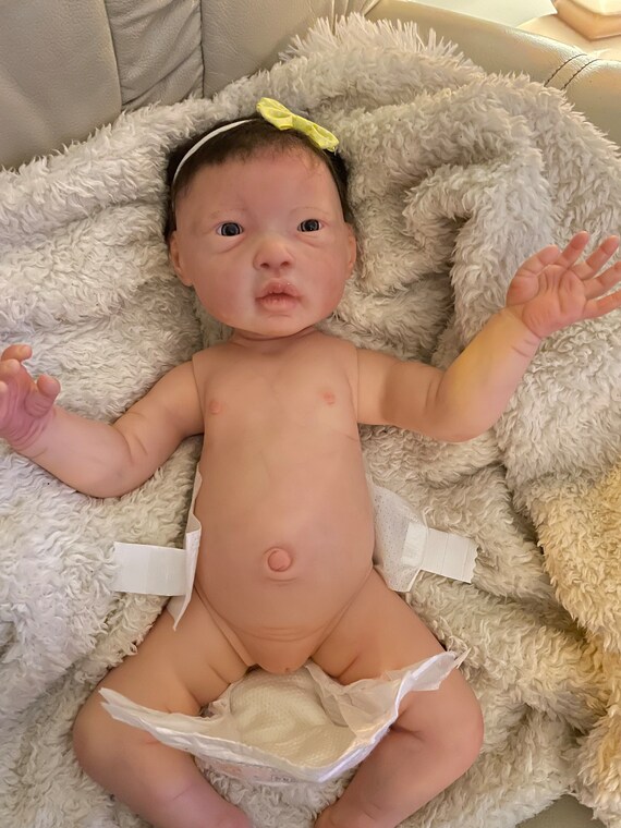 Full body reborn vinyl doll