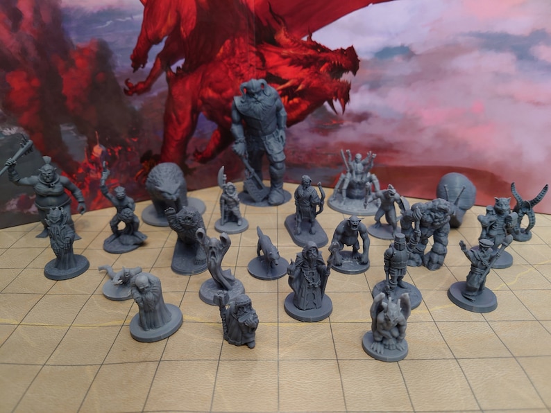 May include: A collection of grey plastic miniature figurines, including a giant, a dragon, a knight, a wizard, and other fantasy creatures. The miniatures are arranged on a gridded surface.