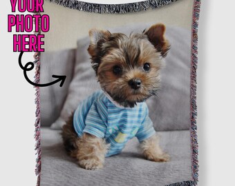 May include: A woven throw blanket featuring a Yorkshire Terrier puppy wearing a blue and white striped shirt. The blanket has a fringed edge and the text "YOUR PHOTO HERE" in pink with a black arrow.