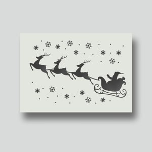 Estêncil de trenó de Papai Noel e rena para floco de neve, ideal para fazer cartões, decoração de Natal, decoração de casa e artesanato natalino. Diversas opções de tamanho disponíveis.