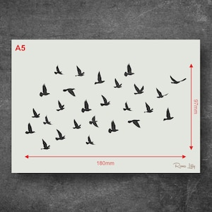 May include: A5 size stencil featuring a flock of birds in flight. The stencil is 180mm wide and 97mm tall. The stencil is made of a durable material and is perfect for creating beautiful wall art.