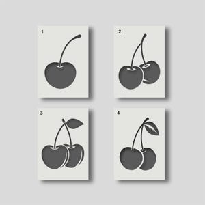 May include: Four black and white cherry stencils, numbered 1 to 4. Each stencil features a different design of cherries.