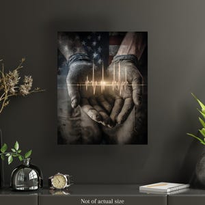 May include: A print featuring a pair of hands cupped together, with a glowing heartbeat line overlayed. The American flag is visible in the background. The image has a distressed, textured appearance.
