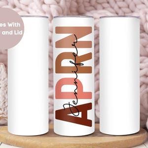 May include: Three stainless steel tumblers with a white background. The middle tumbler has the name "Jennifer" written in brown, pink, and orange letters. The tumblers come with a straw and lid.
