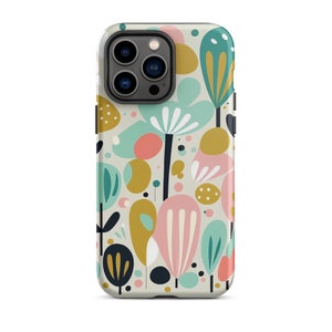 Pode incluir: Uma capa de telefone com um padrão floral abstrato colorido. A capa é branca com flores e formas rosa, azuis, verdes e amarelas.