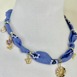 May include: A set of three ceramic mugs with a speckled, matte finish. The mugs are in shades of cream, light gray, and dark gray. Each mug has a simple, minimalist design, perfect for coffee or tea.