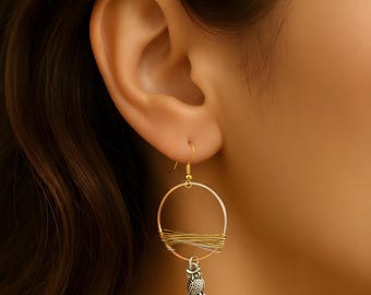 two tone gold and silver earrings with Owl charm.