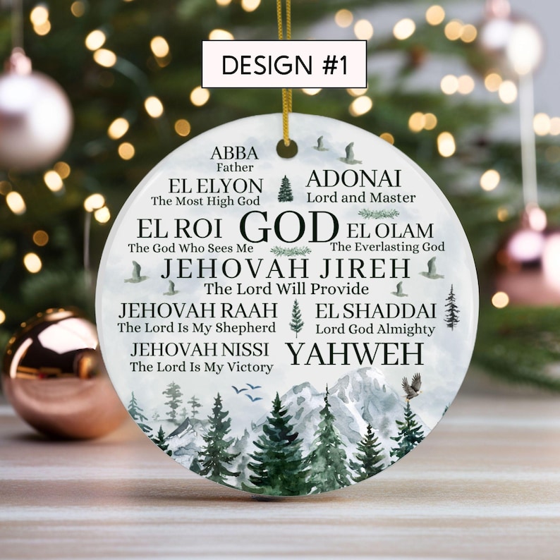 May include: A round white ceramic ornament featuring the text DESIGN #1 at the top. The surface displays various names of God in black lettering, including ABBA, EL ELYON, ADONAI, EL ROI, EL OLAM, JEHOVAH JIREH, JEHOVAH RAAH, EL SHADDAI, JEHOVAH NISSI, and YAHWEH.