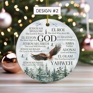 May include: A round ceramic ornament featuring a bald eagle in flight over a forest landscape. The text includes names of God such as Jehovah Shalom, El Roi, El Elyon, El Shaddai, Jehovah Jireh, Abba, Jehovah Raah, Adonai, El Olam, and Yahweh.