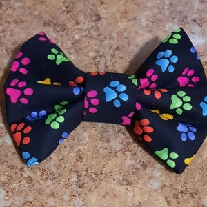 Perdita&#39;s &quot;It is a Black Sprinkled with Neon Paw Prints Kind of Day&quot; Dog Bowtie