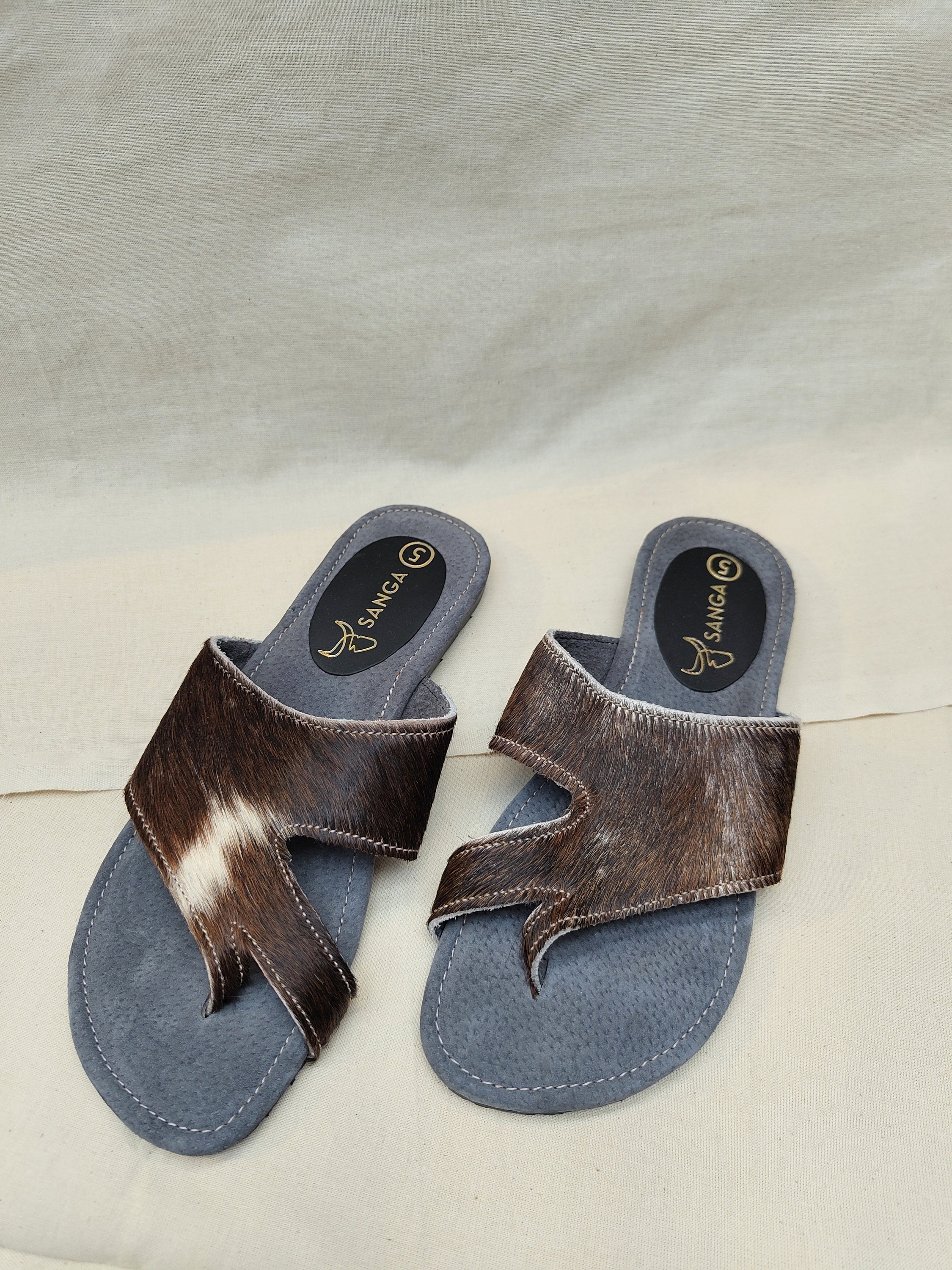 Flip flops with spurs sale