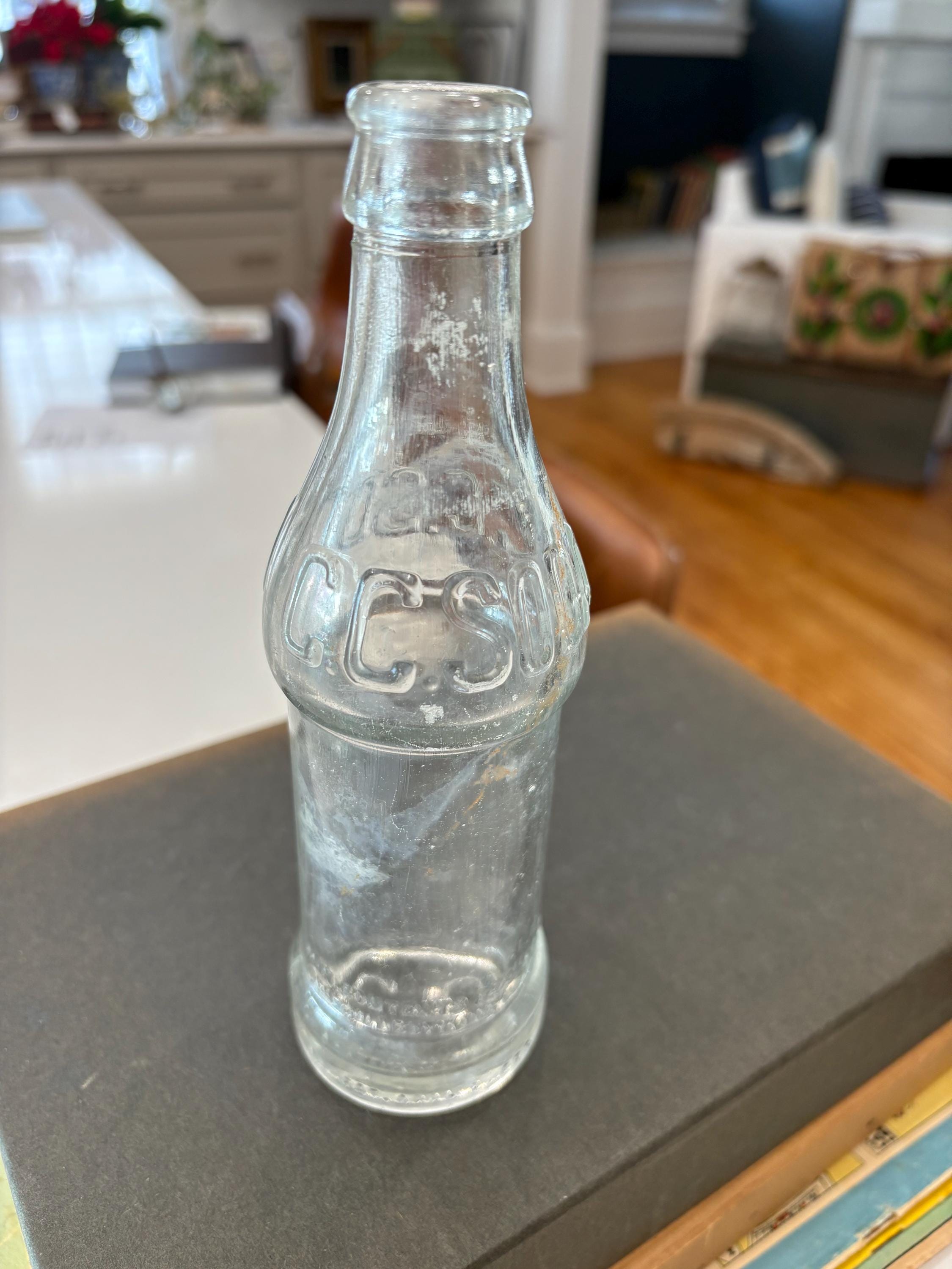 Vintage 1940's Coca-Cola Bottle or CC Soda Bottle; 6.5 oz., Embossed with Coca-Cola name, patent. Coca-Cola memorabilia, old soda bottle