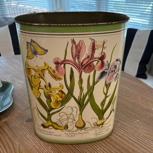 Vintage Floral Wastebasket by Cheinco features Botanical Iris and Butterfly Illustrations.