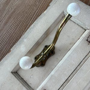 Antique Brass Hook with Porcelain Ends