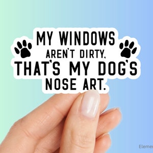 May include: White sticker with black text and paw prints that reads "My windows aren't dirty. That's my dog's nose art."