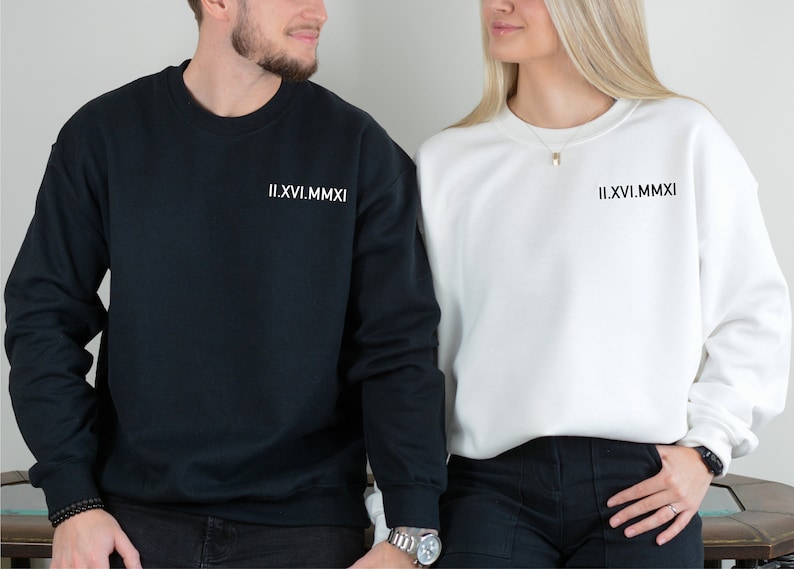May include: Two matching black and white sweatshirts with the text "II.XVI.MMXI" on the front.