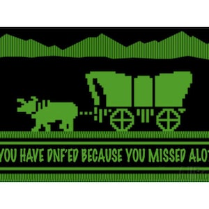 May include: A green pixelated image of a covered wagon being pulled by an ox. The image is set against a black background with green pixelated mountains in the background. The text "YOU HAVE DN'FED BECAUSE YOU MISSED ALOT" is displayed in a green box at the bottom of the image.