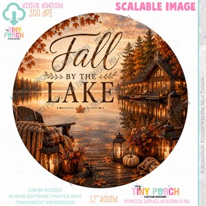 May include: Circular fall-themed sign depicting a lake scene. The image shows a cabin, lake, and the text "Fall by the Lake." The sign is 30.48 cm in diameter and includes autumn leaves and lanterns.
