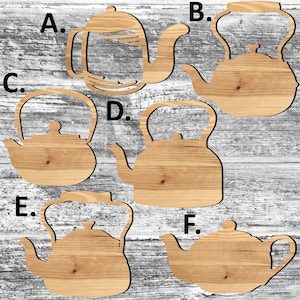 May include: Six wooden teapots in various shapes and sizes, labeled A through F. The teapots are all made of light brown wood and have a natural wood grain finish.