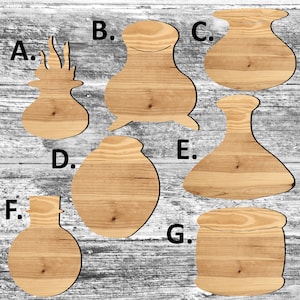 May include: Seven wooden cutouts shaped like different bottles and jars, labeled with letters A through G. The cutouts are made of light brown wood with a natural grain pattern.