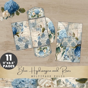 May include: A multipage folio with a blue hydrangea and roses design. The folio is made of paper and has a vintage aesthetic. The text "Blue Hydrangea and Roses" and "MULTIPAGE FOLIO" are visible. The folio is 11" x 8.5" pages.