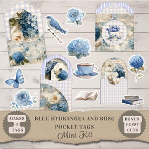 Può includere: Un mini kit di etichette tascabili di ortensie e rose blu con tagli extra. Le etichette presentano disegni floreali, un uccello blu, una farfalla, una tazza da tè e libri. Il testo sull'immagine recita "Blue Hydrangea and Rose Pocket Tags Mini Kit".