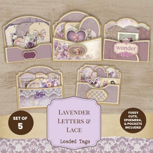 May include: A set of five lavender-themed paper pockets containing various ephemera, including tags, floral illustrations, butterflies, a rabbit, and a label with the word wonder. The set is titled Lavender Letters & Lace Loaded Tags.