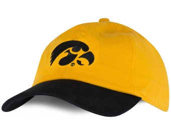 May include: A yellow baseball cap with a black bill. The cap features a black logo of a hawk's head. The cap is made of a soft fabric and has a curved brim. The cap is a classic style and is suitable for everyday wear.