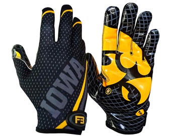 May include: A pair of black and yellow football gloves with a mesh design. The gloves have the word "IOWA" printed on one glove and a black and yellow logo on the other glove.