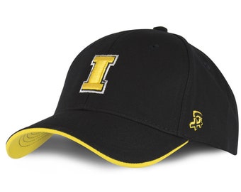 May include: Black baseball cap with a yellow and white embroidered "I" logo on the front. The brim has a yellow underside, and a small yellow logo is on the side. This cap is a stylish accessory.
