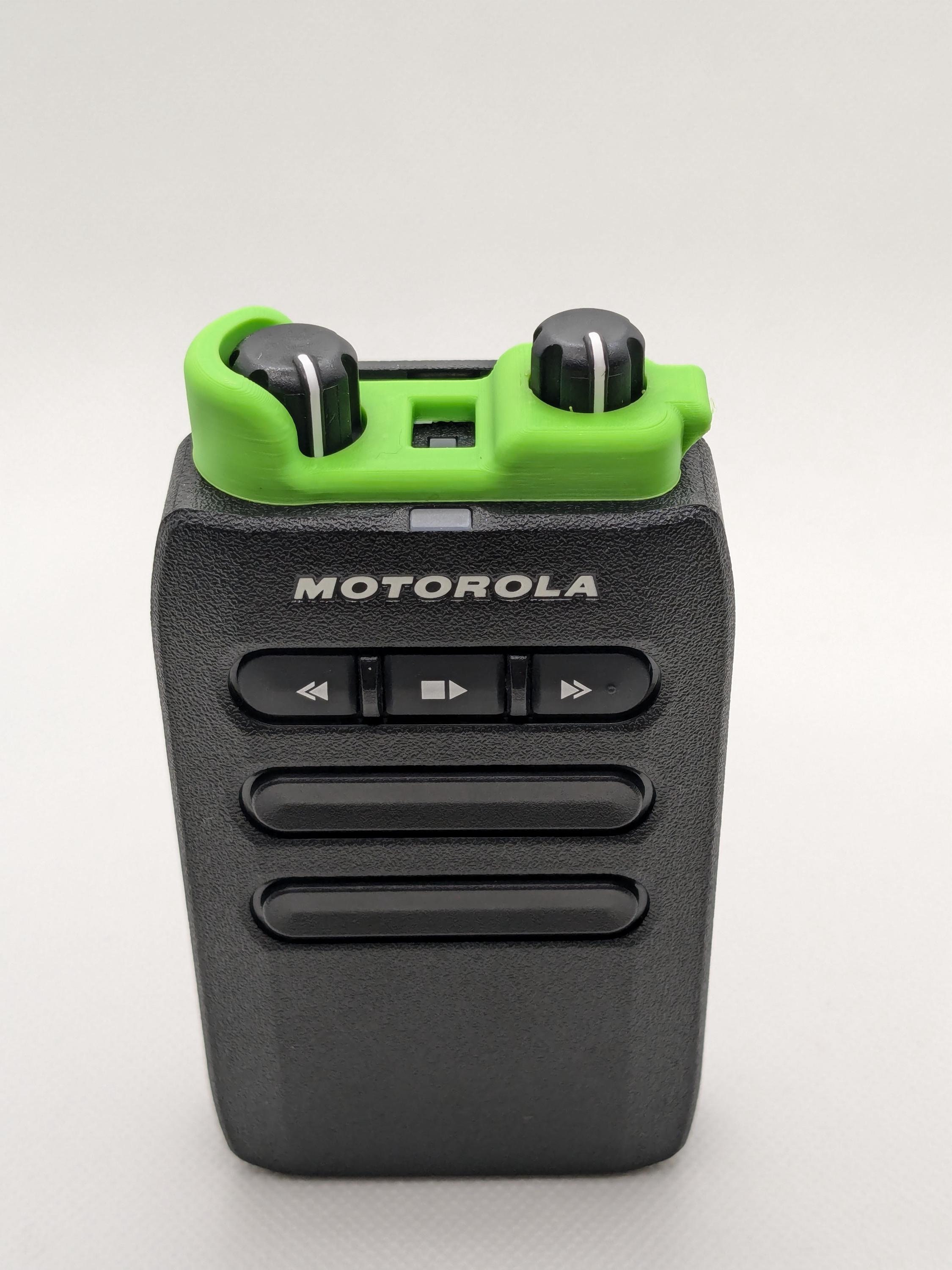 The Pager Blocker - A pager knob guard accessory preventing Volume + Channel from changing