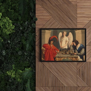 May include: A framed painting depicting three figures playing chess. The figures are a man in a red robe, a woman with wings, and a man in a brown robe. The painting is set against a background of a white wall and a wooden floor.